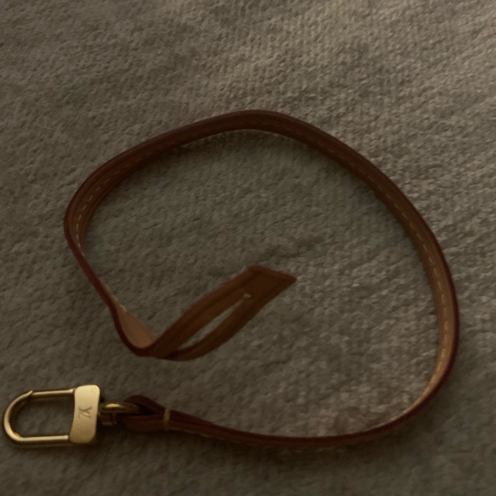 Louis Vuitton wristlet vachetta strap